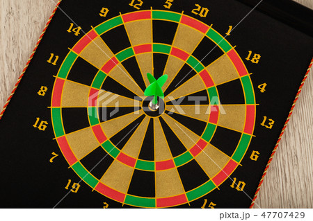 The game of darts, darts on the target. The game of darts, darts on the target. 47707429