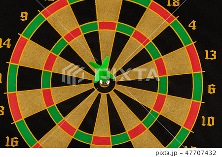 The game of darts, darts on the target. The game of darts, darts on the target. 47707432
