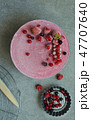 Vegan raw cake with berry, cashew cream, top view 47707640