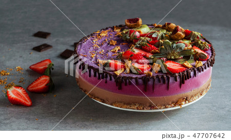 Vegan raw cake with berry, cashew cream, top view 47707642
