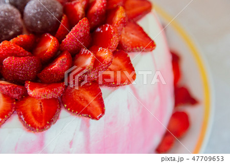 Bright beautiful mouth-watering strawberry cake 47709653