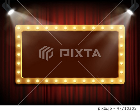 Gold frame with light bulbs on red velvet curtain. 47710305