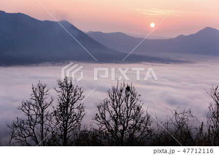 Sunrise viewpoint And fog covering mountains, Thai Sunrise viewpoint And fog covering mountains, Thai 47712116