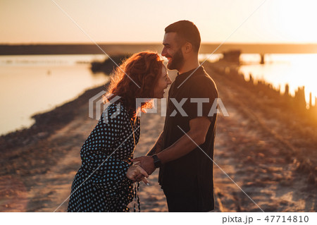 happy young couple posing at the camera 47714810