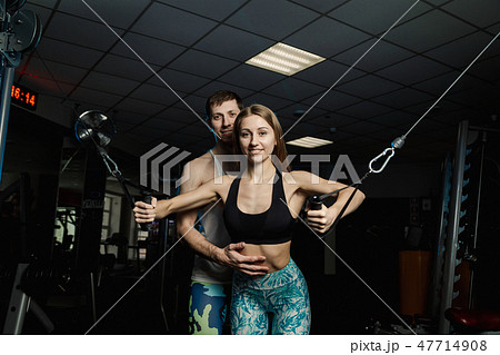 Active beautiful fitness model girl trains the Active beautiful fitness model girl trains the 47714908