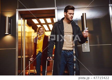 Hotel room searching. Lovely couple enter to the hotel floor 47715422