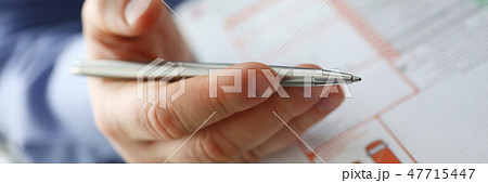 Male insurer hand hold silver pen an accident 47715447