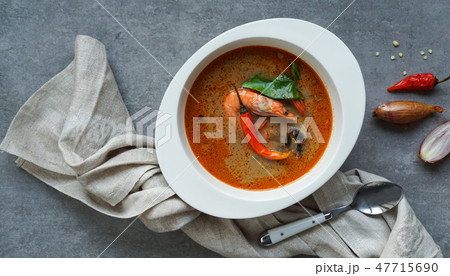 Tom Yam kung Spicy Thai soup with shrimp, seafood 47715690