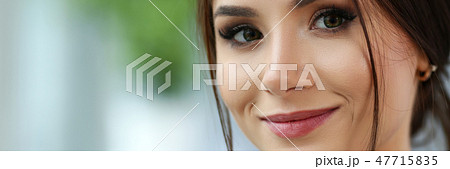 Beautiful smiling clerk girl wearing suit hold notebook 47715835