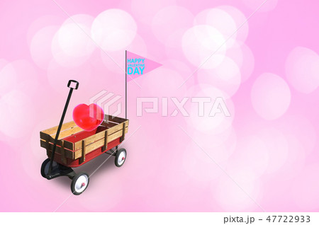 Heart in little red wood wagon. Heart in little red wood wagon. 47722933