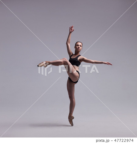 Beautiful Ballet Dancer Posing On Pointes. Beautiful Ballet Dancer Posing On Pointes. 47722974