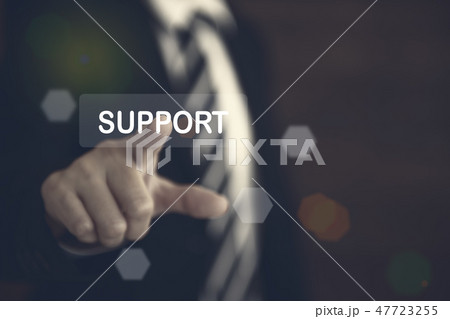 Businessman pointing the text support 47723255