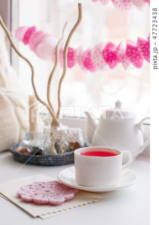 Still life of used candles, tea, teapot, pillow Still life of used candles, tea, teapot, pillow 47723438