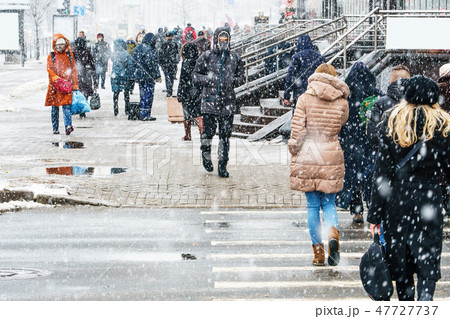 Blizzard in an urban environment. Rush Crowd 47727737