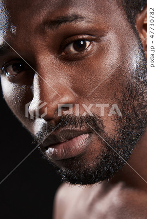 Close up of a young handsome afro American man 47730782