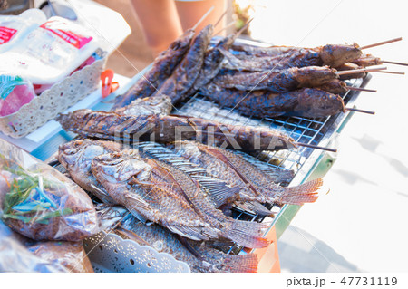 grilled and fried fish grilled and fried fish 47731119