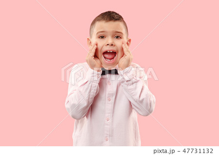 Isolated on pink young casual boy shouting at studio Isolated on pink young casual boy shouting at studio 47731132