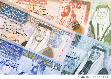 Jordanian Dinar, a business background Jordanian Dinar, a business background 47732454