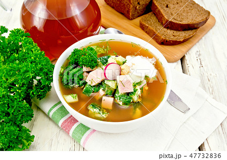 Okroshka in white bowl on napkin Okroshka in white bowl on napkin 47732836