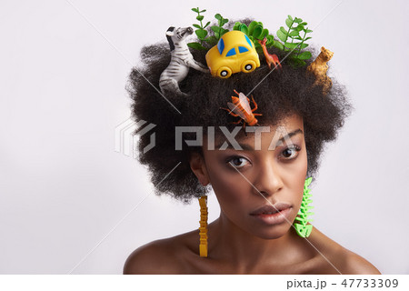 Portrait of ethnic lady with odd hairstyle 47733309
