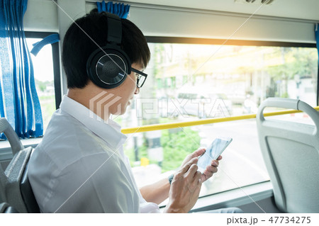 Passenger transport. people in the bus. man rides a bus, listeni Passenger transport. people in the bus. man rides a bus, listeni 47734275