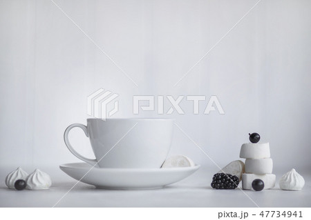 Cup of coffee, white background. Marshmallows Cup of coffee, white background. Marshmallows 47734941