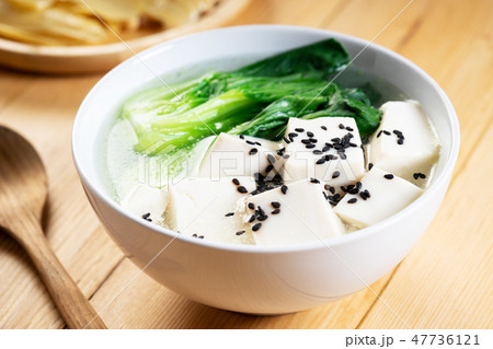 Tofu soup on wooden background 47736121
