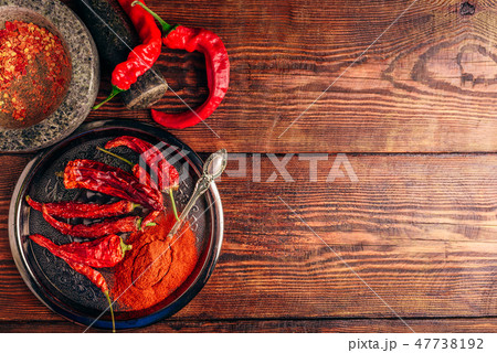 Fresh, dried and ground red chili peppers 47738192