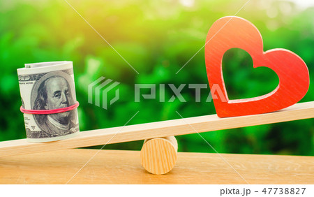 Money versus love concept. Passion versus profit.  47738827