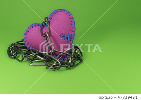 Heart-shaped trinket toy on metal chain 47739431