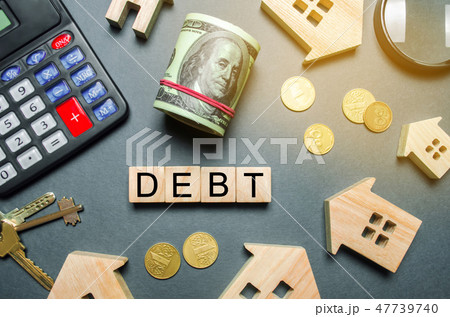 Wooden houses, a calculator, keys, coins 47739740