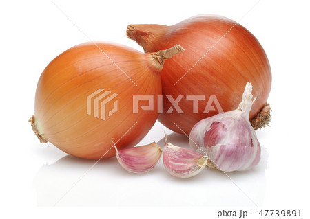 Onion and garlic on white background Onion and garlic on white background 47739891