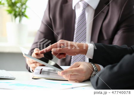 Two businessman are looking and Two businessman are looking and 47740078
