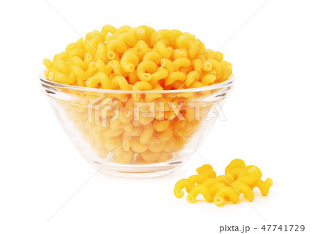 Row pasta in a glass bowl 47741729