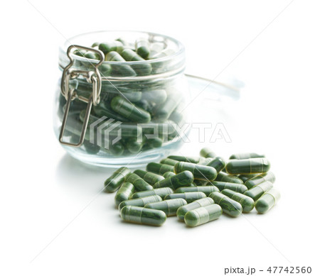 Green chlorella pills or green barley pills. Green chlorella pills or green barley pills. 47742560