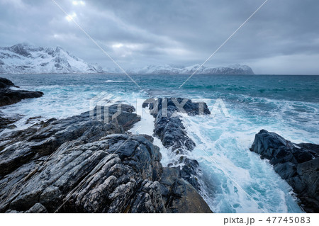 Norwegian Sea waves on rocky coast of Lofoten islands, Norway 47745083