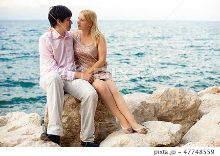 Young sexy blonde woman and man at romantic date at vacation 47748559
