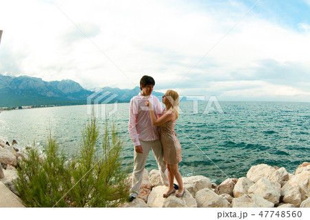 Young sexy blonde woman and man at romantic date at vacation 47748560