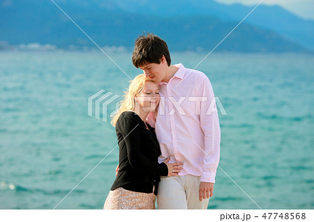 Young sexy blonde woman and man at romantic date at vacation 47748568