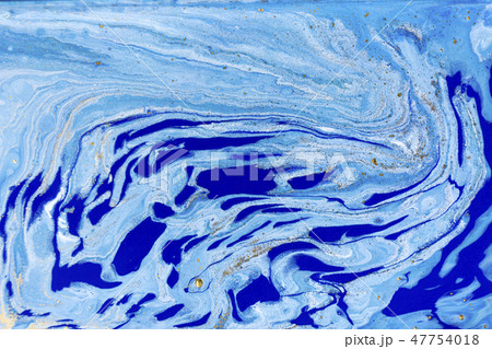 Blue and gold marbling pattern. Golden marble liquid texture. Blue and gold marbling pattern. Golden marble liquid texture. 47754018