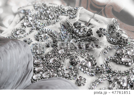Grey evening dress with many rhinestones on top. Grey evening dress with many rhinestones on top. 47761851