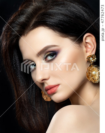 Portrait of beautiful woman with evening make up Portrait of beautiful woman with evening make up 47762473