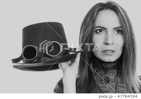 Steampunk girl with hat. Steampunk girl with hat. 47764594