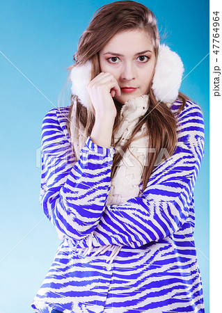 Young woman in wintertime. 47764964