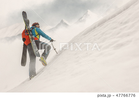 Skier on top of mountain, winter sport Skier on top of mountain, winter sport 47766776