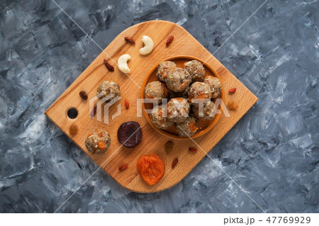 Natural healthy raw energy bites. Top view. Natural healthy raw energy bites. Top view. 47769929