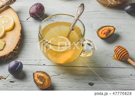 Cup of tea with lemon, honey and ginger 47770828