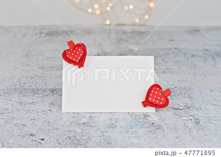 Closeup Valentine card with red hearts 47771895