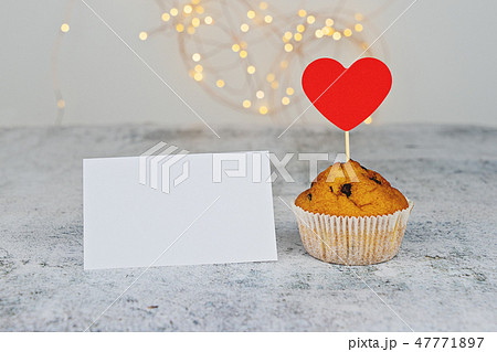 One tasty cupcake with big red heart One tasty cupcake with big red heart 47771897