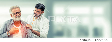 Doctor checking patient health in hospital office. 47773838